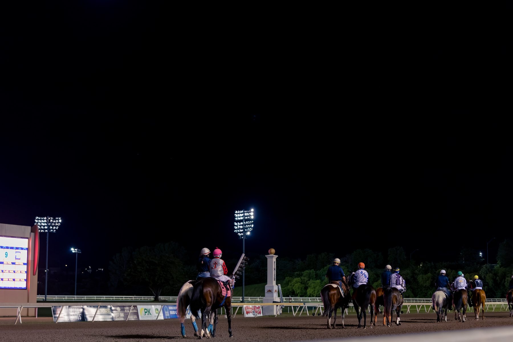 Horses at the finish pole, Remington Park